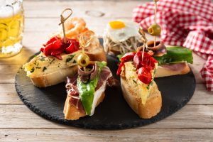 assortment spanish pintxos wooden table typical spanish food