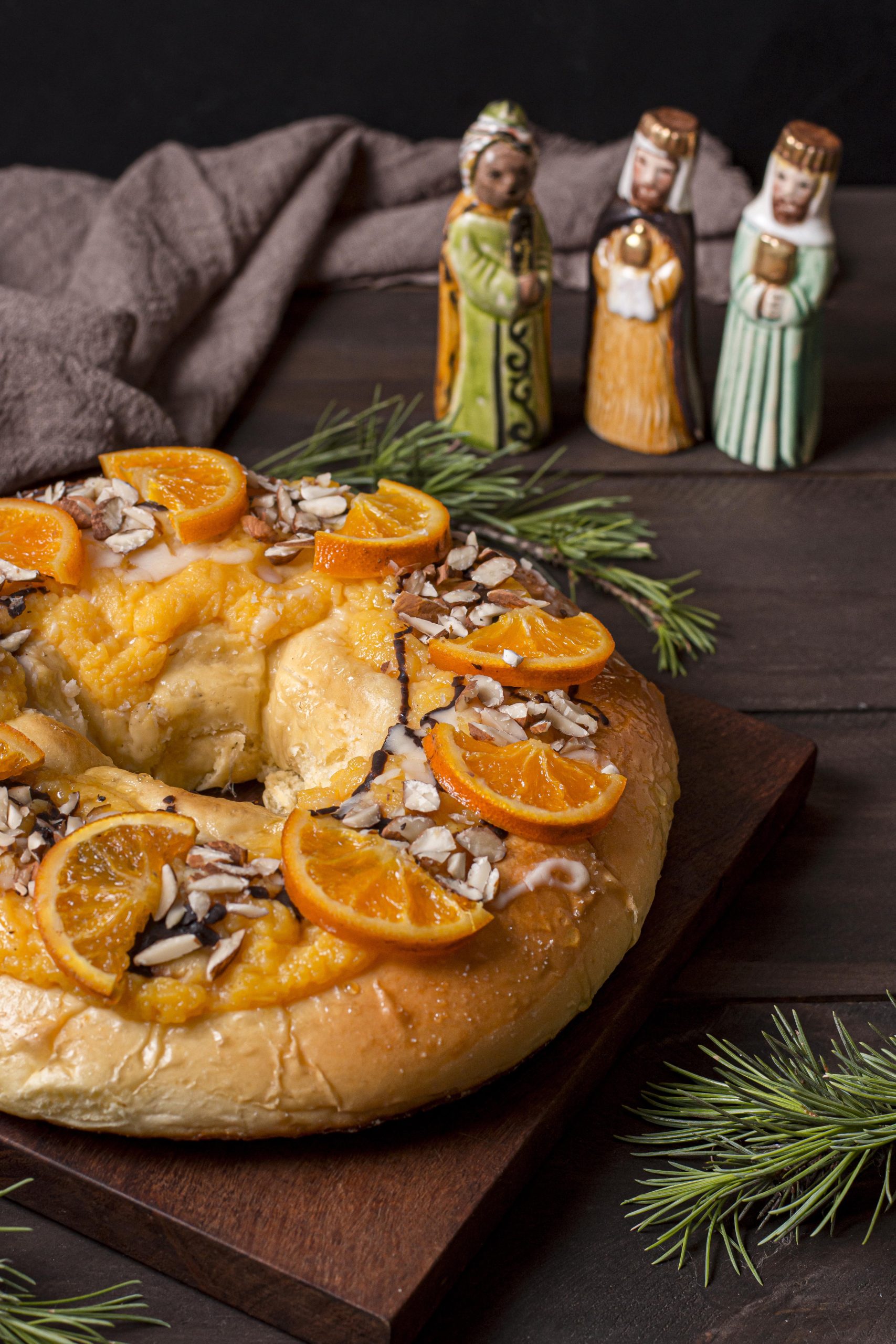 epiphany day food with sliced oranges holy characters scaled